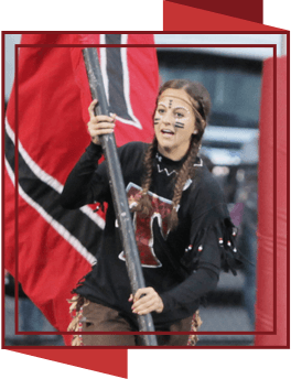 Student carrying school flag