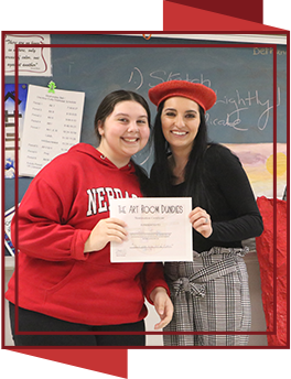 Two girls holding a certificate